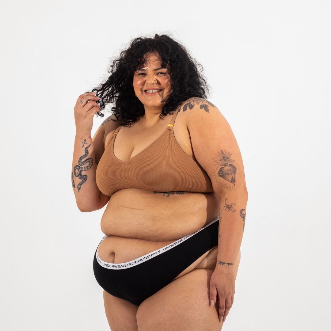 Sustainable, ethically produced nude 4 - tan olive skin tone wireless bra by Underwear for Humanity. A -D cup sizes. Recycled materials, flexible, supportive. Knitted bra and band, adjustable straps. Models wear the A-D bra.
