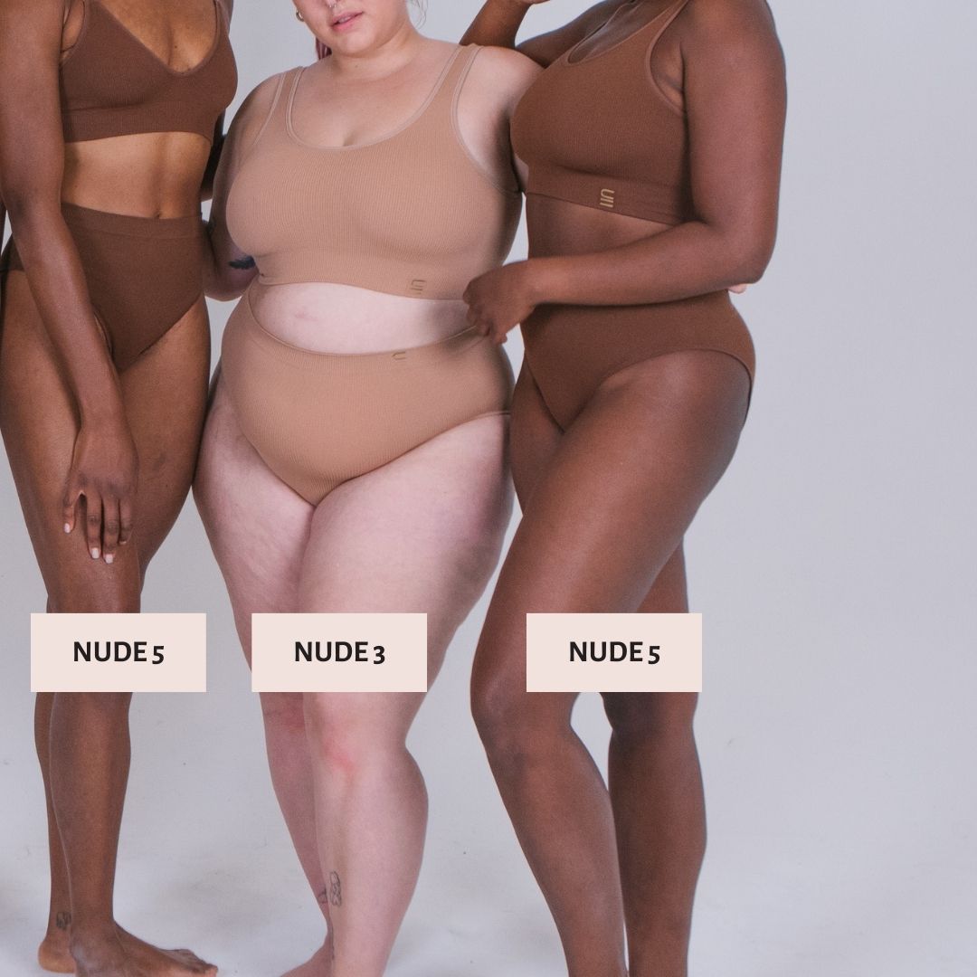Sustainable nude 5 medium dark skin tone seam free high waist brief by Underwear for Humanity: ethical, sustainable. sizes 6-26. light, breathable, stretches across sizes. Models wear high-waisted underwear. underwear sits high on the waist, full seat coverage, Seam free underwear. made from recycled nylon