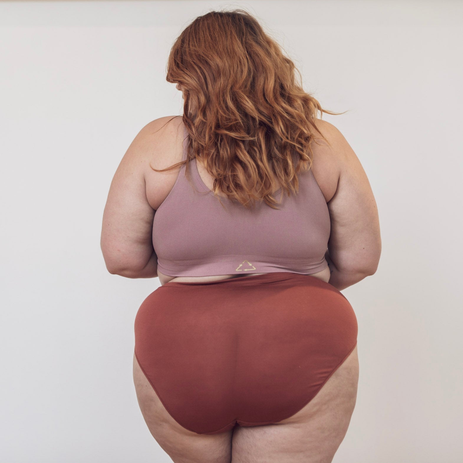 Sustainable clay high waist brief by Underwear for Humanity: ethical, sustainable. sizes 6-26. light, breathable. Models wear high-waisted underwear. underwear sits high on the waist, full seat coverage. smooth under clothing. made from Tencel and recycled materials