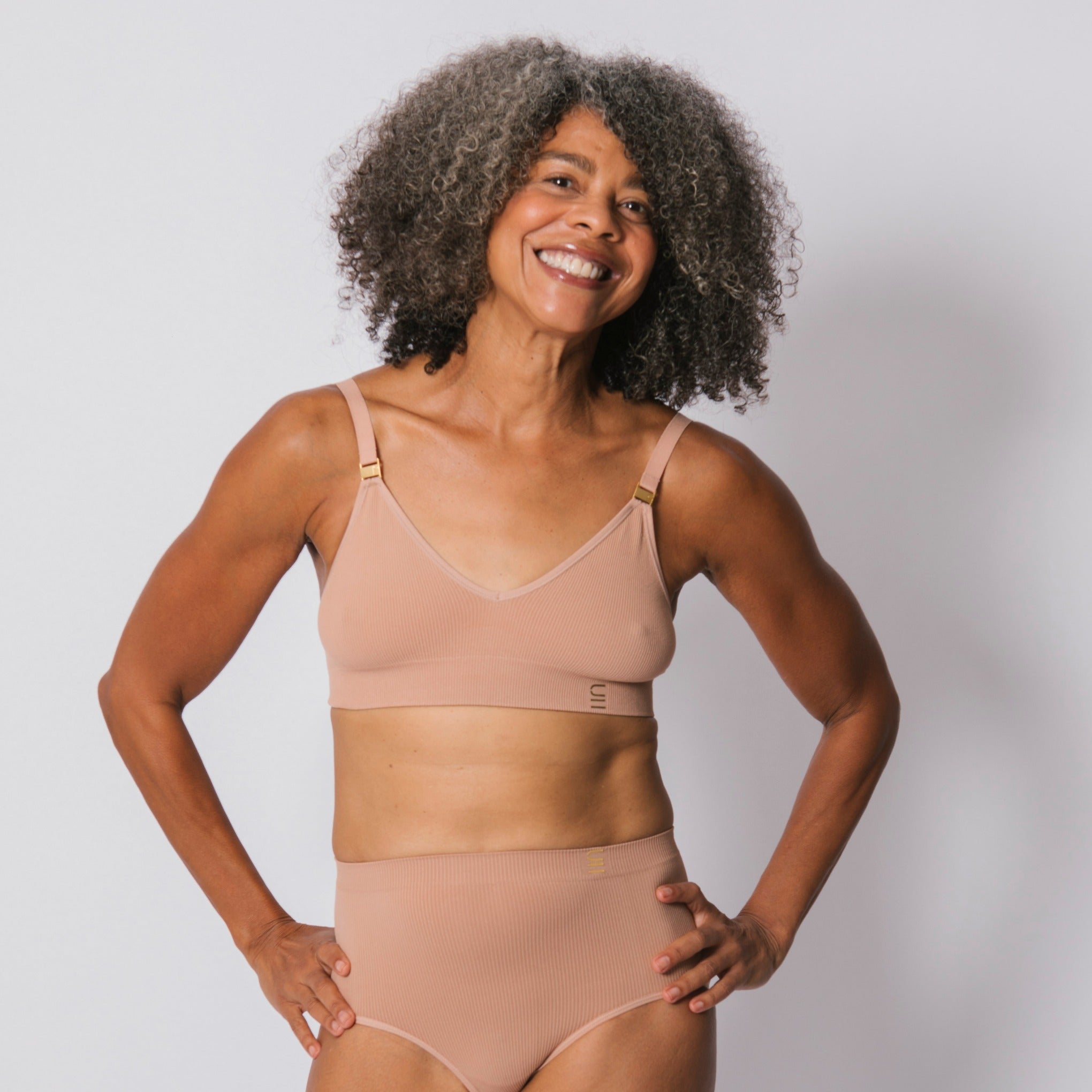 Sustainable, ethically produced Nude 3- light beige skin tone wireless bra by Underwear for Humanity. A -D cup sizes. Recycled materials, flexible, supportive. Knitted bra and band, adjustable straps. Models wear the A-D bra.