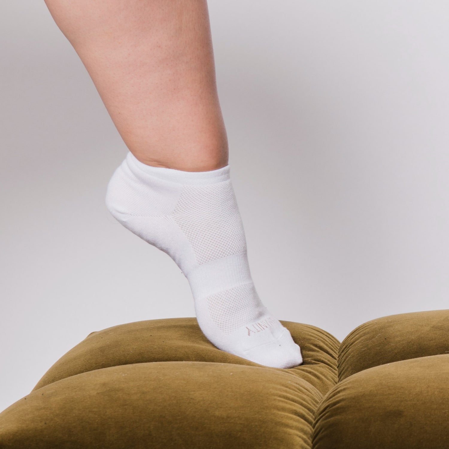 Sustainable, ethically produced white sneaker style women&