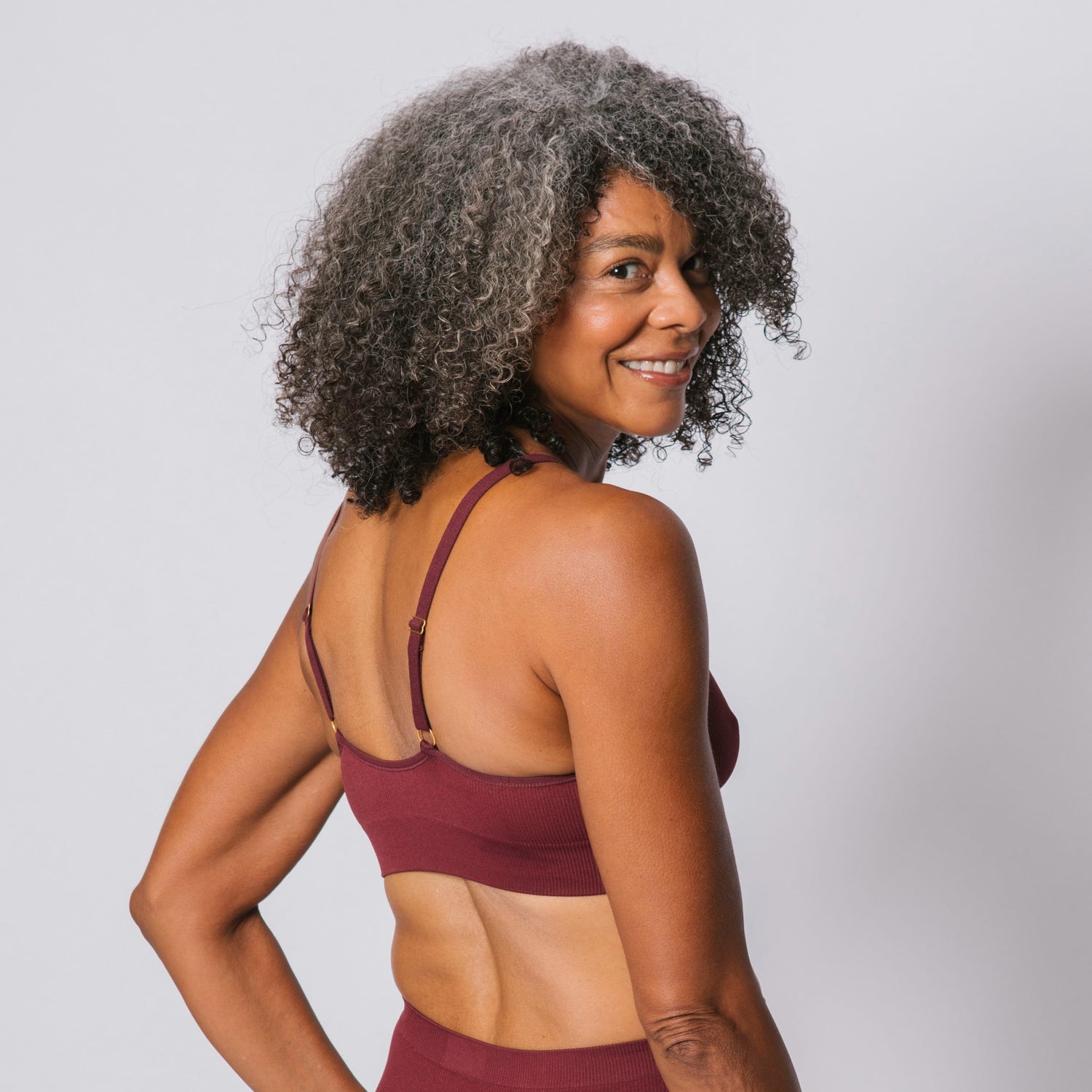 Sustainable, ethically produced Cranberry wireless bra by Underwear for Humanity. A -D cup sizes. Recycled materials, flexible, supportive. Knitted bra and band, adjustable straps. Models wear the A-D bra.