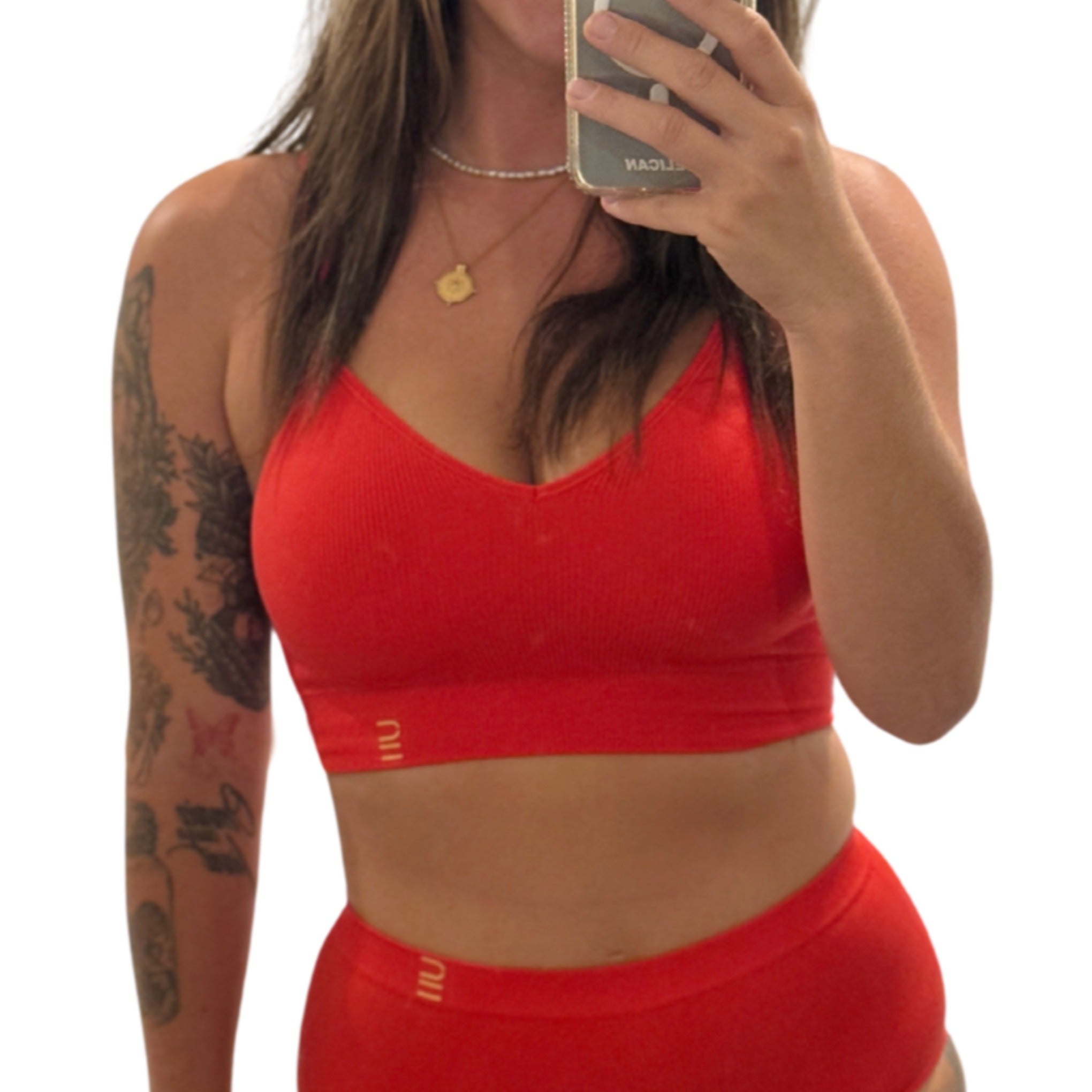 Sustainable, ethically produced flame wireless bra by Underwear for Humanity. For DD-GG cup sizes. Recycled materials, flexible, supportive. Knitted bra and band, adjustable straps. Model wears the DD+ bra.