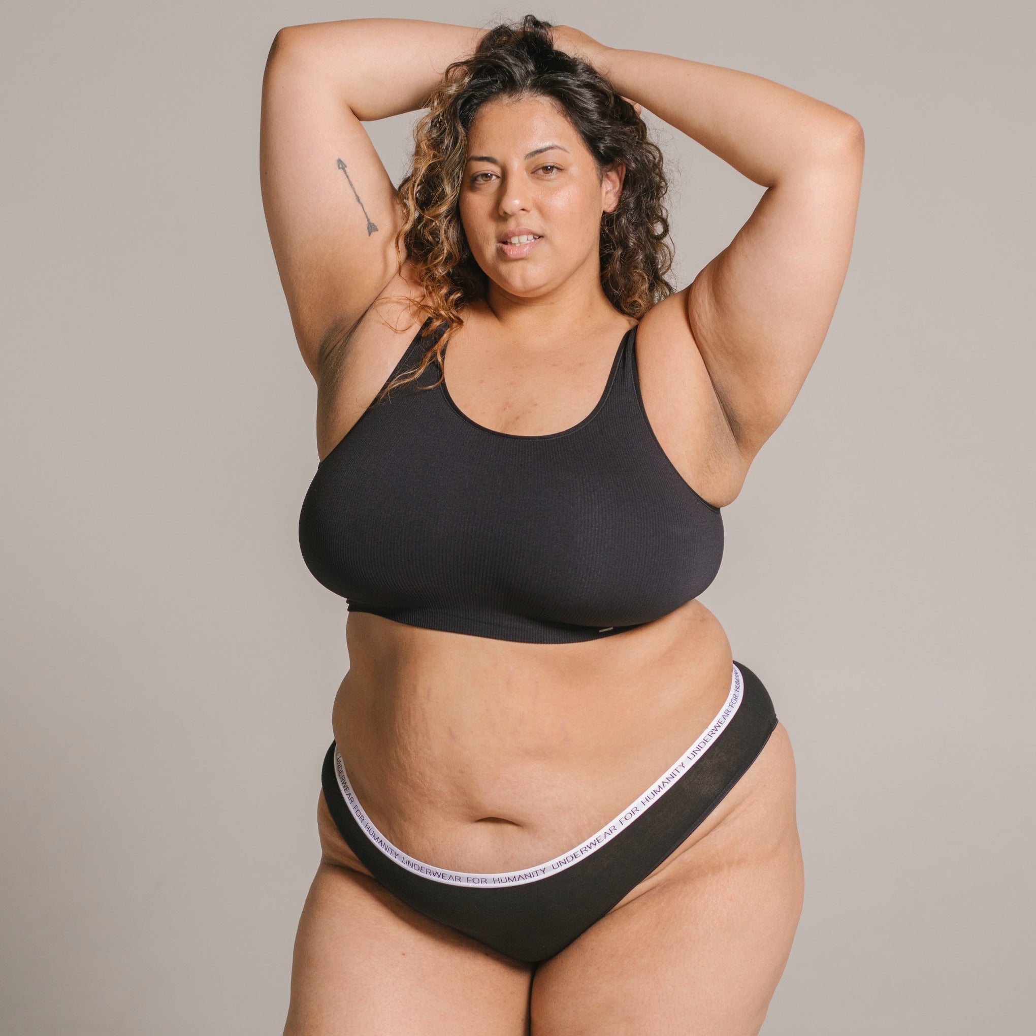 Organic cotton bikini briefs in black – eco-friendly and sustainable underwear."