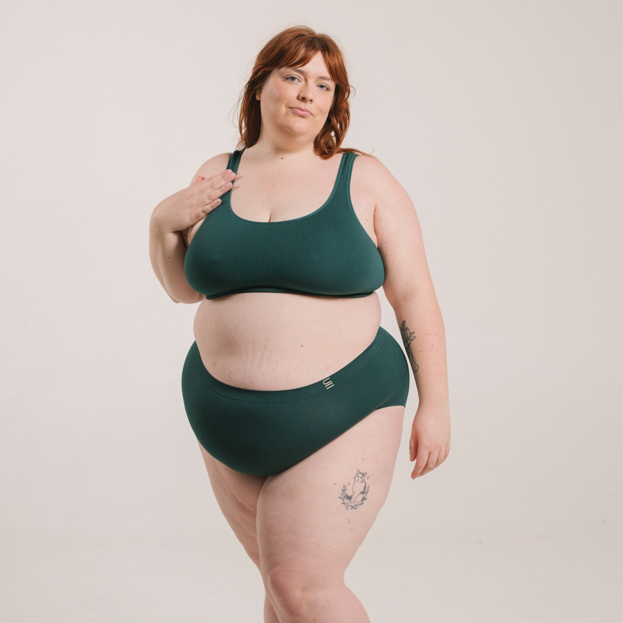 Sustainable, ethically produced atlantis bra crop by Underwear for Humanity: stronger support for larger bust, D - GG cup sizes. Recycled materials, knitted bra and band, seamfree, made from recycled nylon. Models wear the D+ Crop
