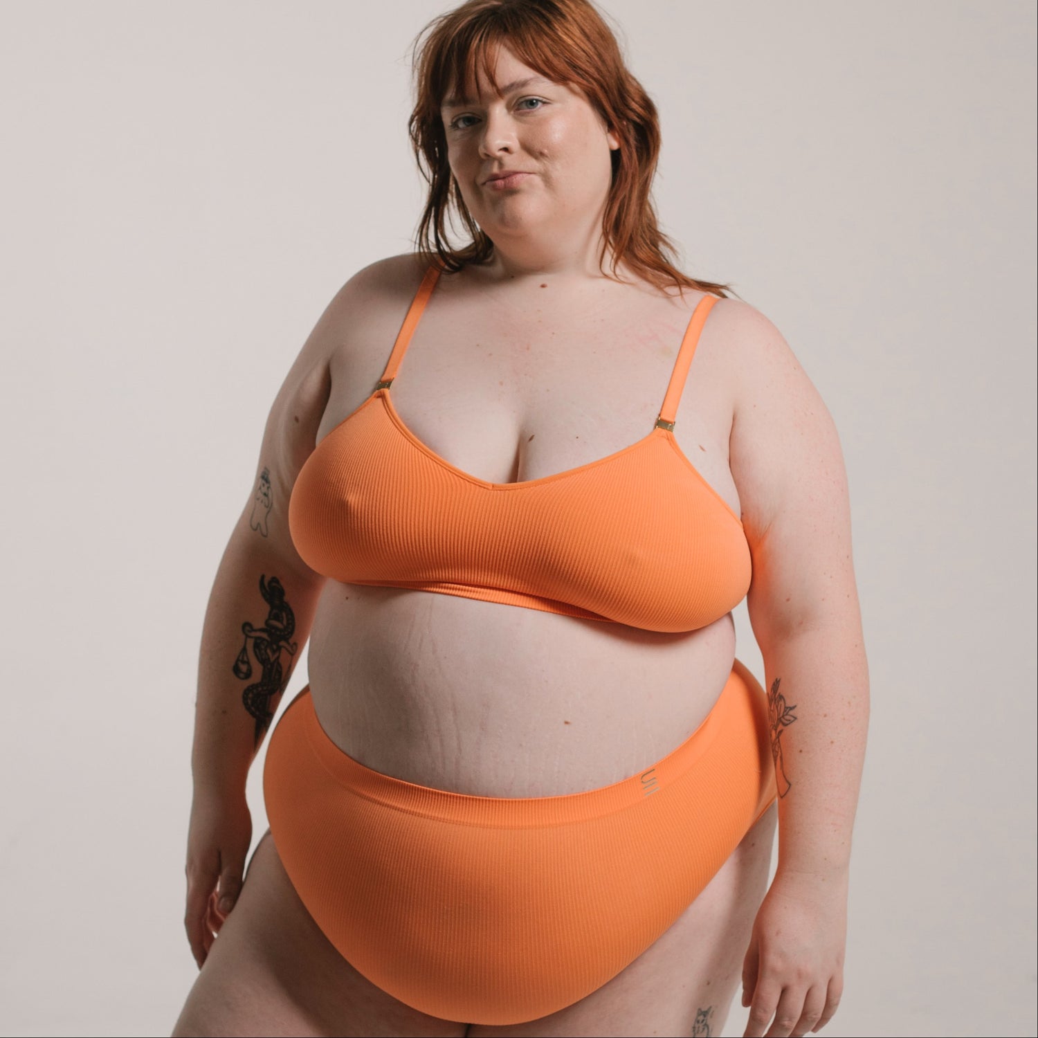 Sustainable, ethically produced mandarin wireless bra by Underwear for Humanity. A -D cup sizes. Recycled materials, flexible, supportive. Knitted bra and band, adjustable straps. Models wear the A-D bra.