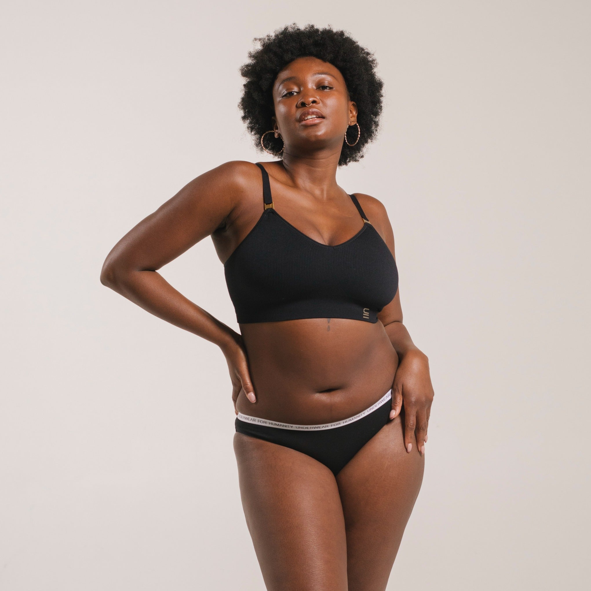 Organic cotton bikini briefs in black – eco-friendly and sustainable underwear.