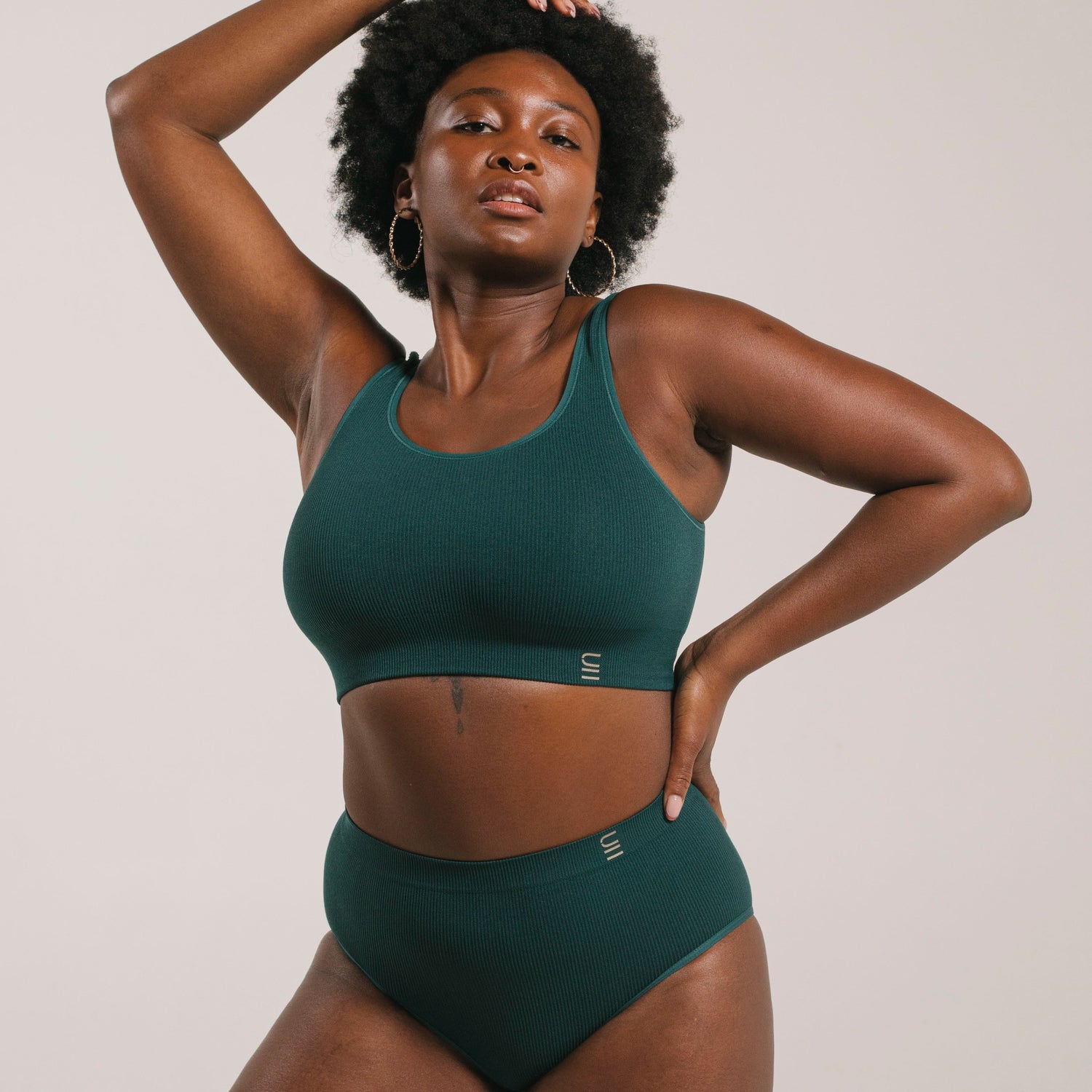 Sustainable, ethically produced atlantis bra crop by Underwear for Humanity: stronger support for larger bust, D - GG cup sizes. Recycled materials, knitted bra and band, seamfree, made from recycled nylon. Models wear the D+ Crop