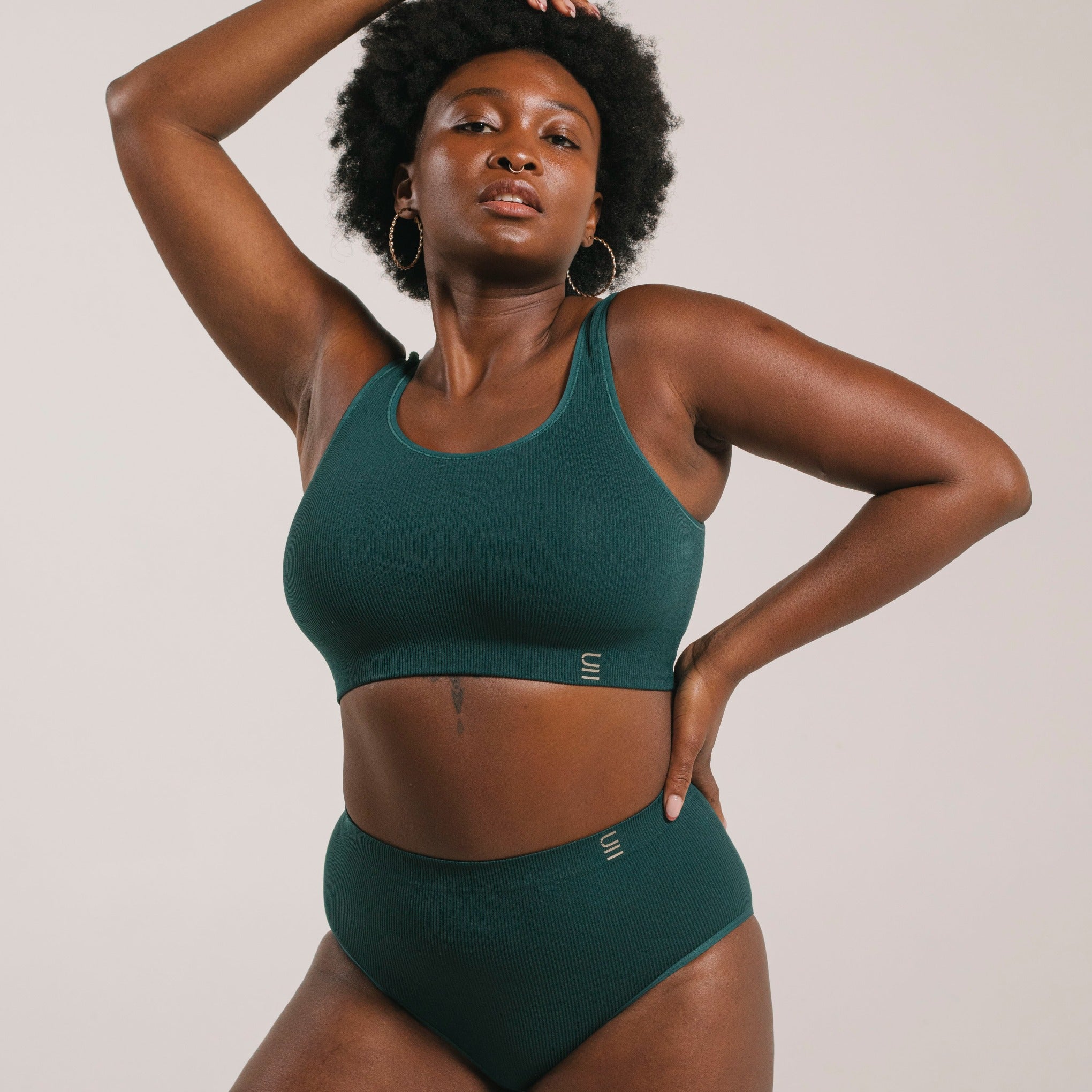 Sustainable, ethically produced atlantis bra crop by Underwear for Humanity: stronger support for larger bust, D - GG cup sizes. Recycled materials, knitted bra and band, seamfree, made from recycled nylon. Models wear the D+ Crop
