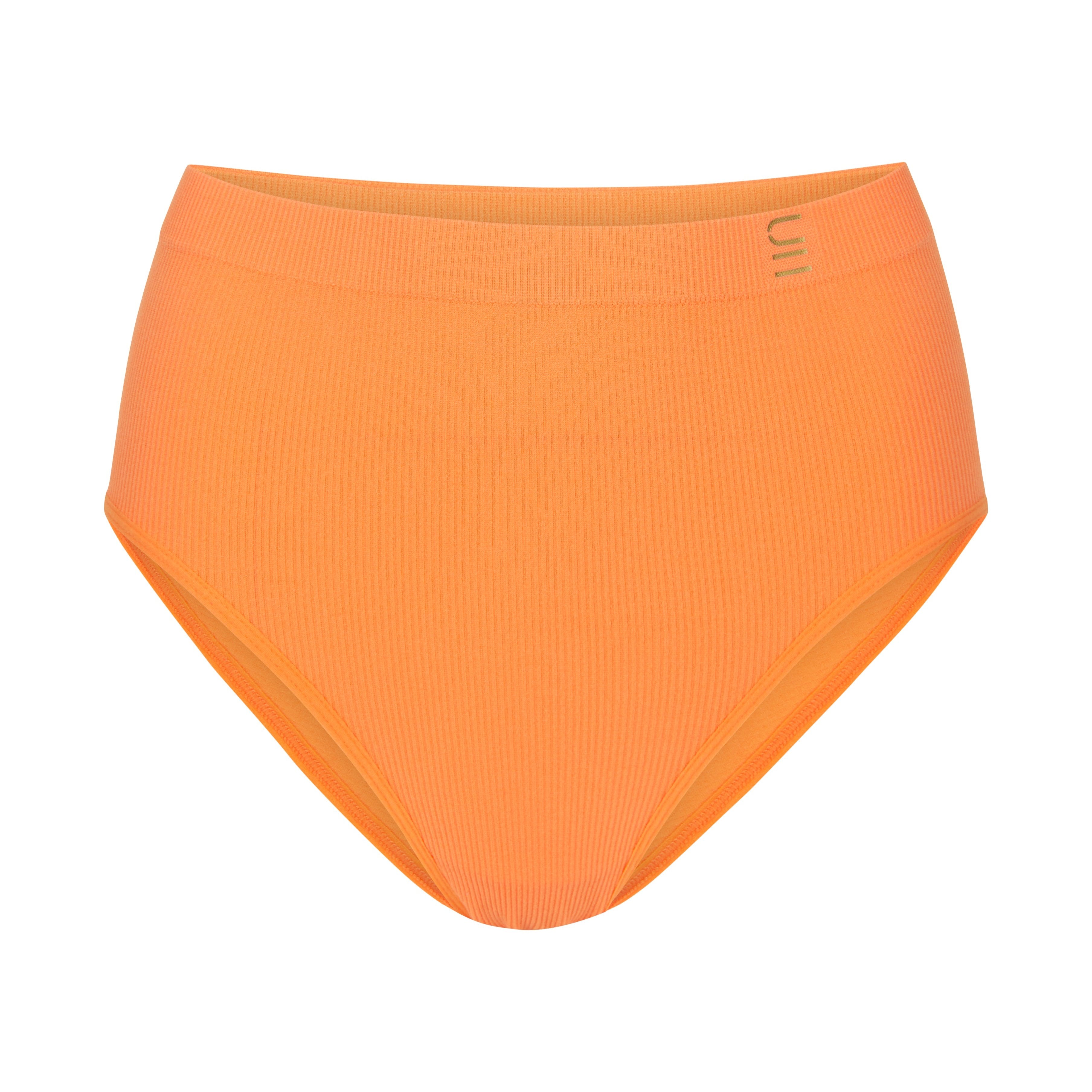 Sustainable, ethically produced mandarin wireless bra by Underwear for Humanity. A -D cup sizes. Recycled materials, flexible, supportive. Knitted bra and band, adjustable straps. Models wear the A-D bra.