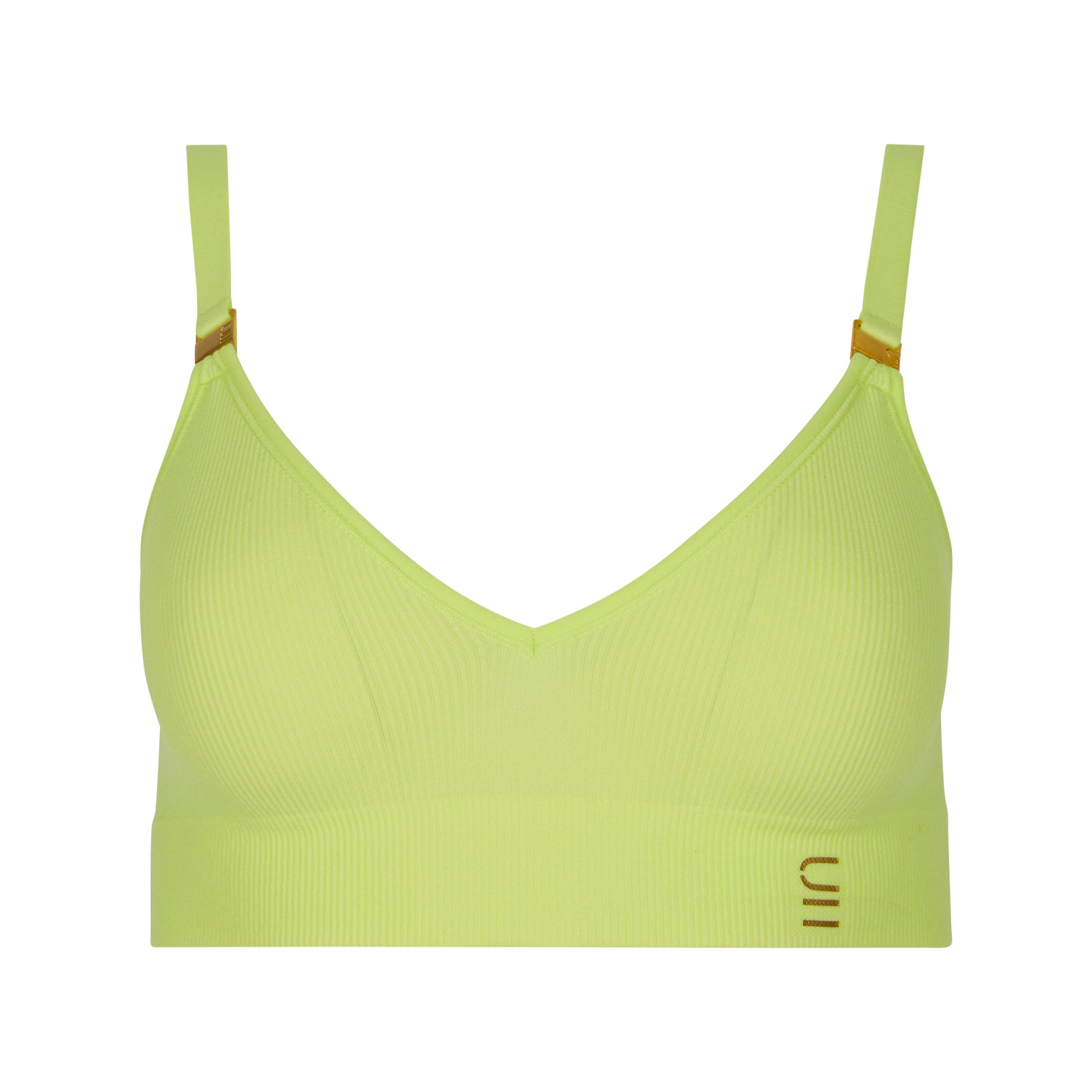 Sustainable, ethically produced lime wireless bra by Underwear for Humanity. For DD-GG cup sizes. Recycled materials, flexible, supportive. Knitted bra and band, adjustable straps. Model wears the DD+ bra.