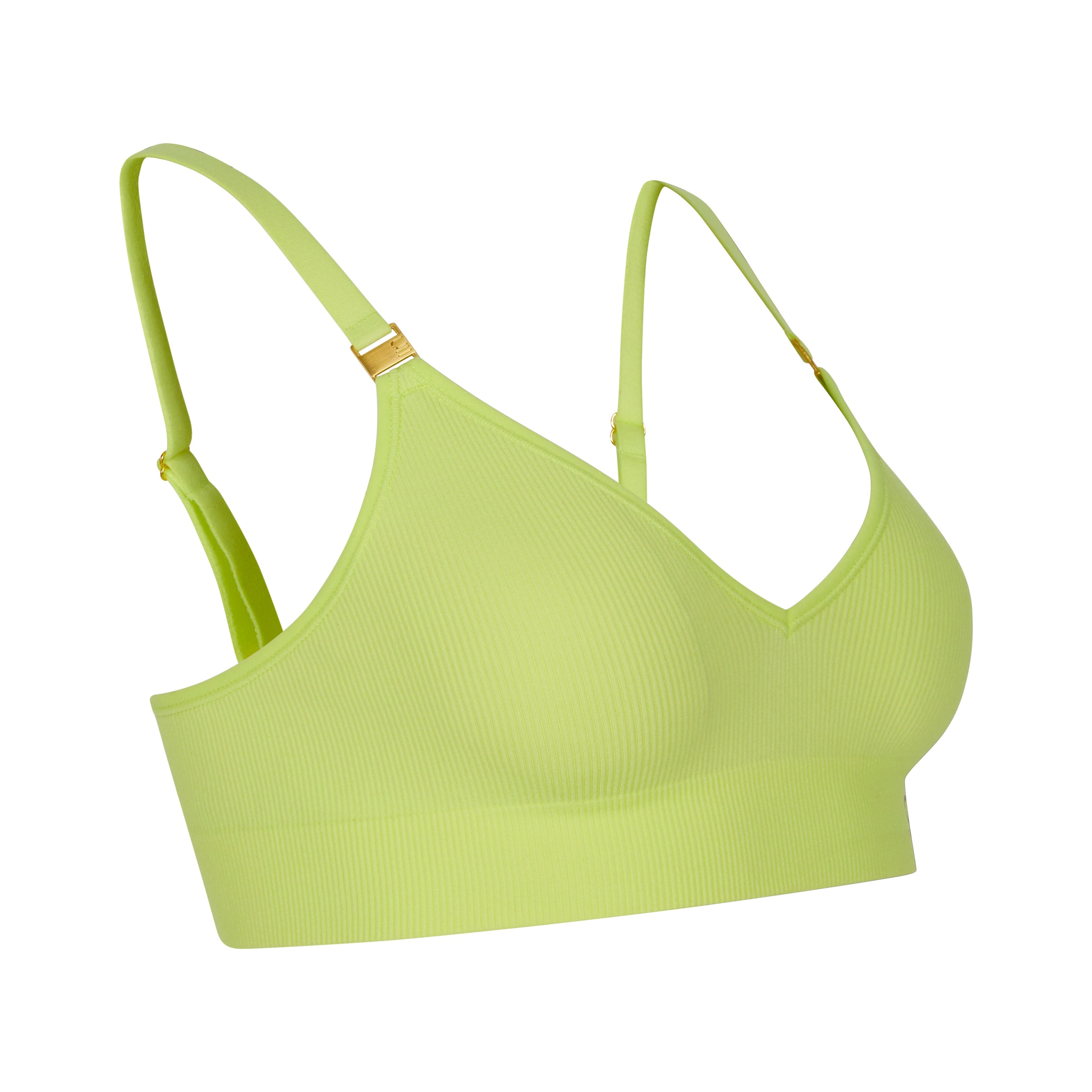 Sustainable, ethically produced lime wireless bra by Underwear for Humanity. For DD-GG cup sizes. Recycled materials, flexible, supportive. Knitted bra and band, adjustable straps. Model wears the DD+ bra.