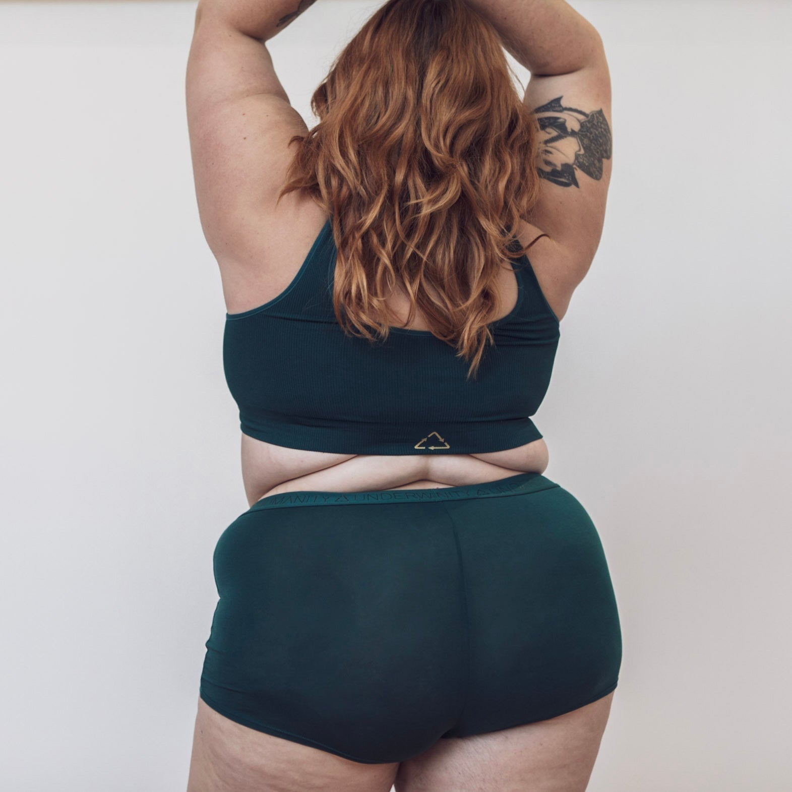 Sustainable, ethically produced atlantis bra crop by Underwear for Humanity: stronger support for larger bust, D - GG cup sizes. Recycled materials, knitted bra and band, seamfree, made from recycled nylon. Models wear the D+ Crop
