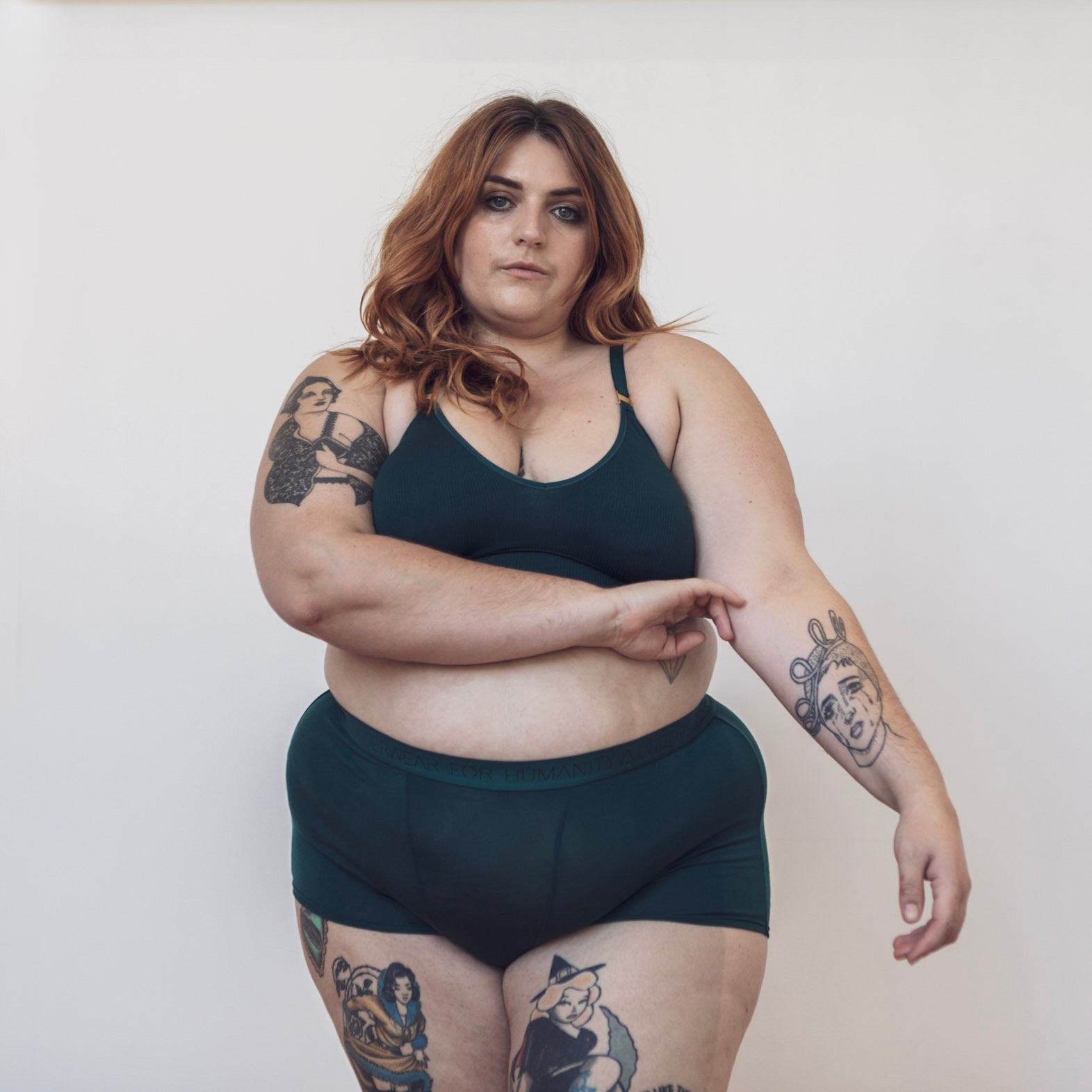 Sustainable, ethically produced atlantis shorts by Underwear for Humanity. Mid-rise, full coverage seat, thin, no-dig, elastic waist, short length sits higher on the leg. Made from sustainable tencel and recycled elastic. Models wear the shorts.