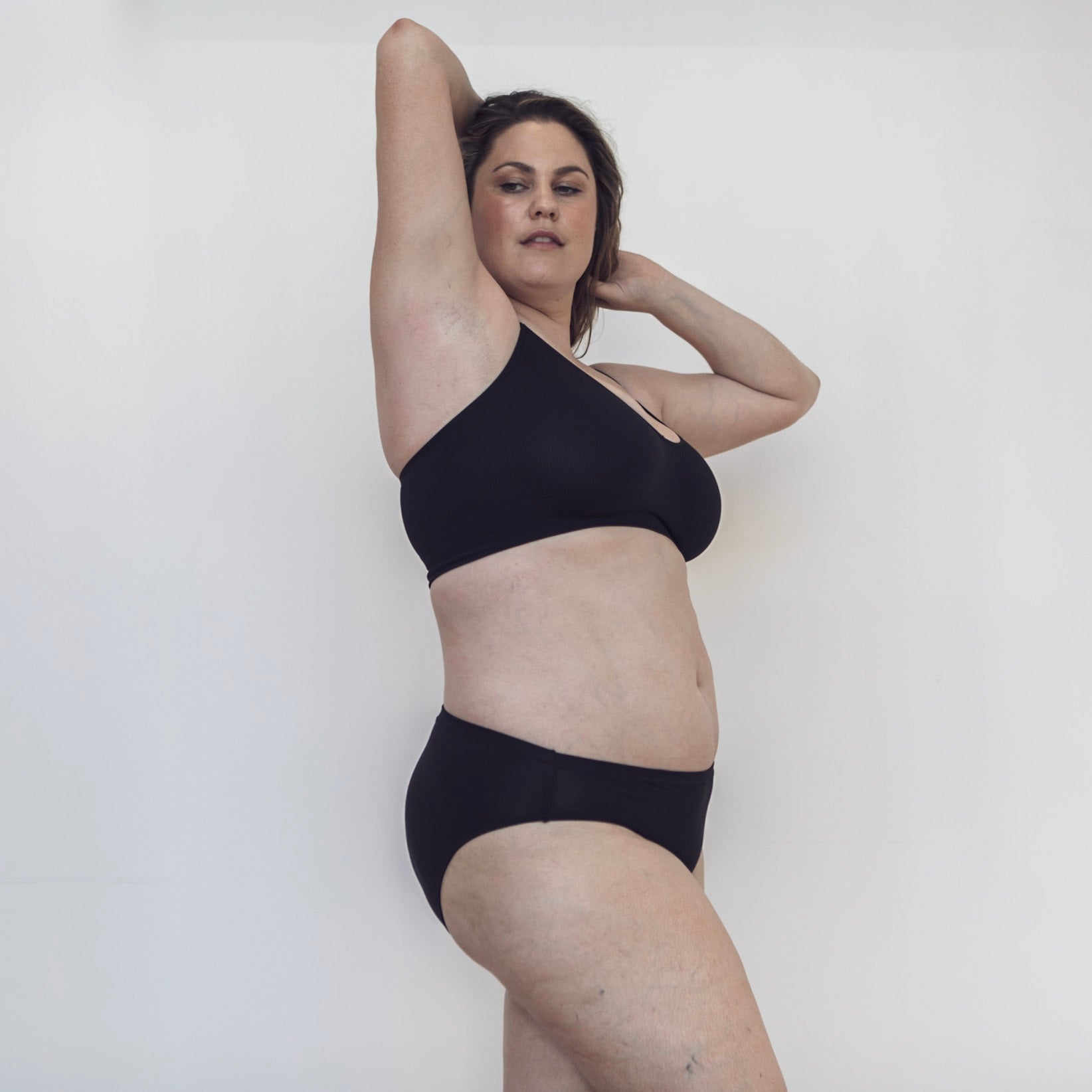 Sustainable black bikini brief by Underwear for Humanity. ethical, sustainable. Lower rise, full coverage seat, soft tencel, breathable.
