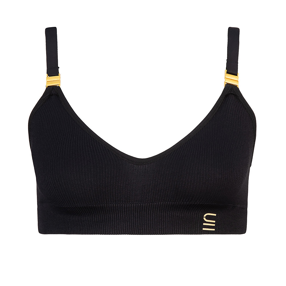 Sustainable, ethically made, black wireless maternity bra by Underwear For Humanity. A -D and DD-GG cup sizes. Recycled materials, flexible, supportive, pregnancy, feeding, convertible. Knitted bra and band, adjustable straps. Model wears maternity bra