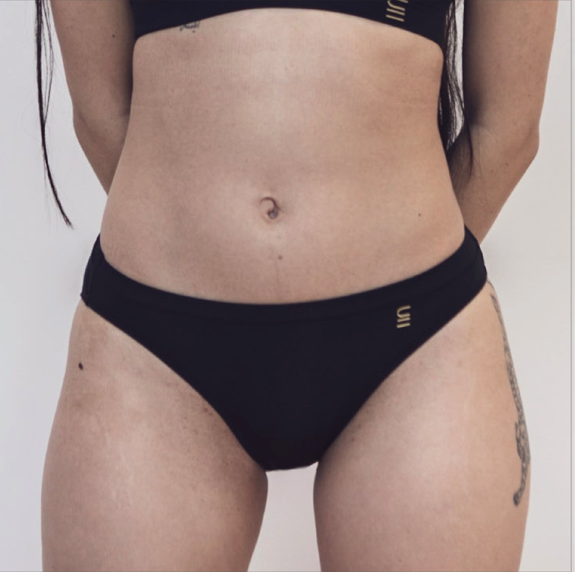 Sustainable black bikini brief by Underwear for Humanity. ethical, sustainable. Lower rise, full coverage seat, soft tencel, breathable.