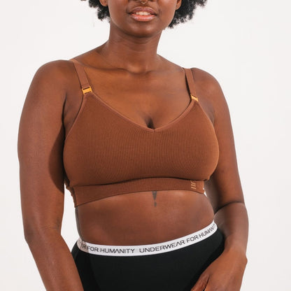Sustainable, ethically produced Nude 5- medium dark skin tone wireless bra by Underwear for Humanity. A -D cup sizes. Recycled materials, flexible, supportive. Knitted bra and band, adjustable straps. Models wear the A-D bra.