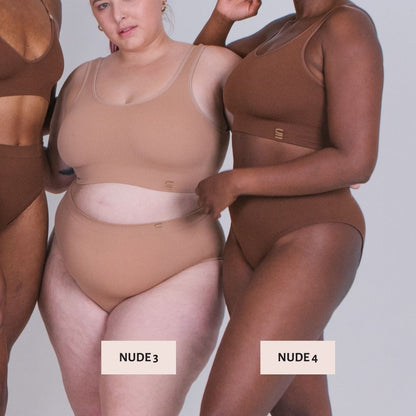 Models wear recycled nylon seamfree Underwear for Humanity nude range for comparison.