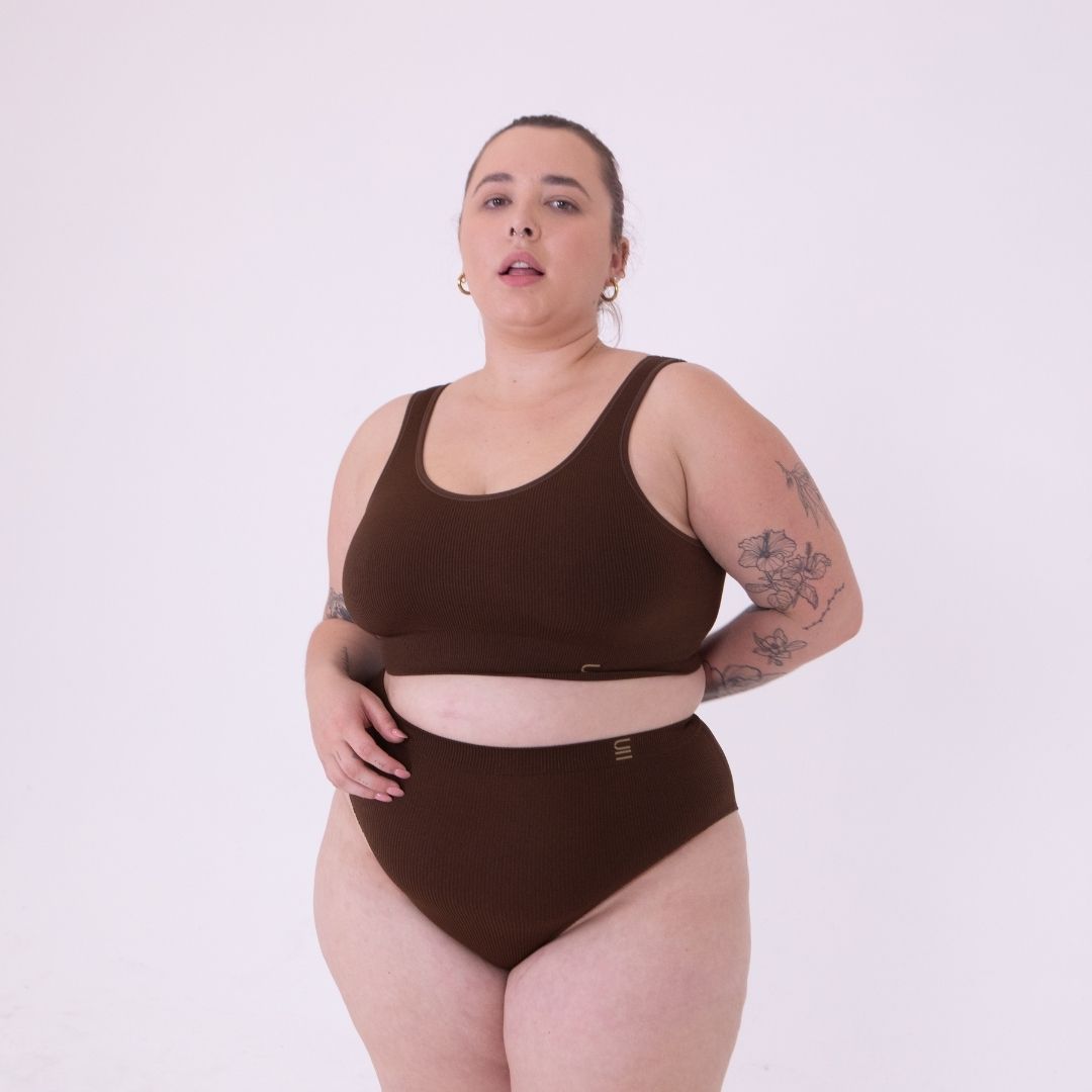 Sustainable, ethically produced Nude 6 - dark skin tone wireless bra by Underwear for Humanity. A -D cup sizes. Recycled materials, flexible, supportive. Knitted bra and band, adjustable straps. Models wear the A-D bra.