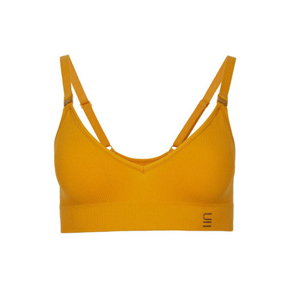 Sustainable, ethically produced Gold wireless bra by Underwear for Humanity. A -D cup sizes. Recycled materials, flexible, supportive. Knitted bra and band, adjustable straps. Models wear the A-D bra.