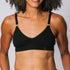 Sustainable Black wireless bra by Underwear For Humanity: ethical, sustainable. A -D cup sizes. Recycled materials, flexible, supportive. Knitted bra and band, adjustable straps. Model wears A-D bra
