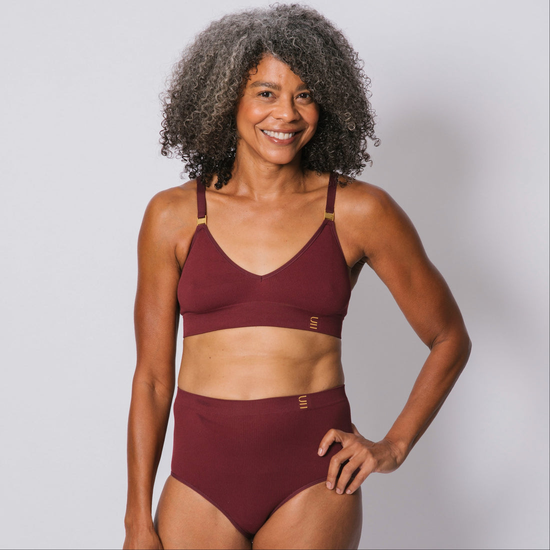 Sustainable, ethically produced Cranberry wireless bra by Underwear for Humanity. A -D cup sizes. Recycled materials, flexible, supportive. Knitted bra and band, adjustable straps. Models wear the A-D bra.