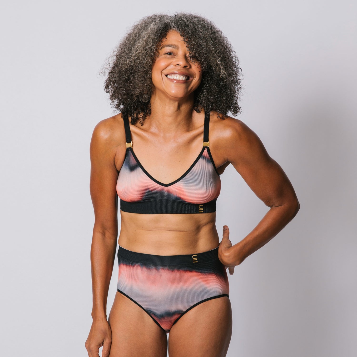 Sustainable, ethically produced elements wireless bra by Underwear for Humanity. A -D cup sizes. Recycled materials, flexible, supportive. Knitted bra and band, adjustable straps. Models wear the A-D bra.
