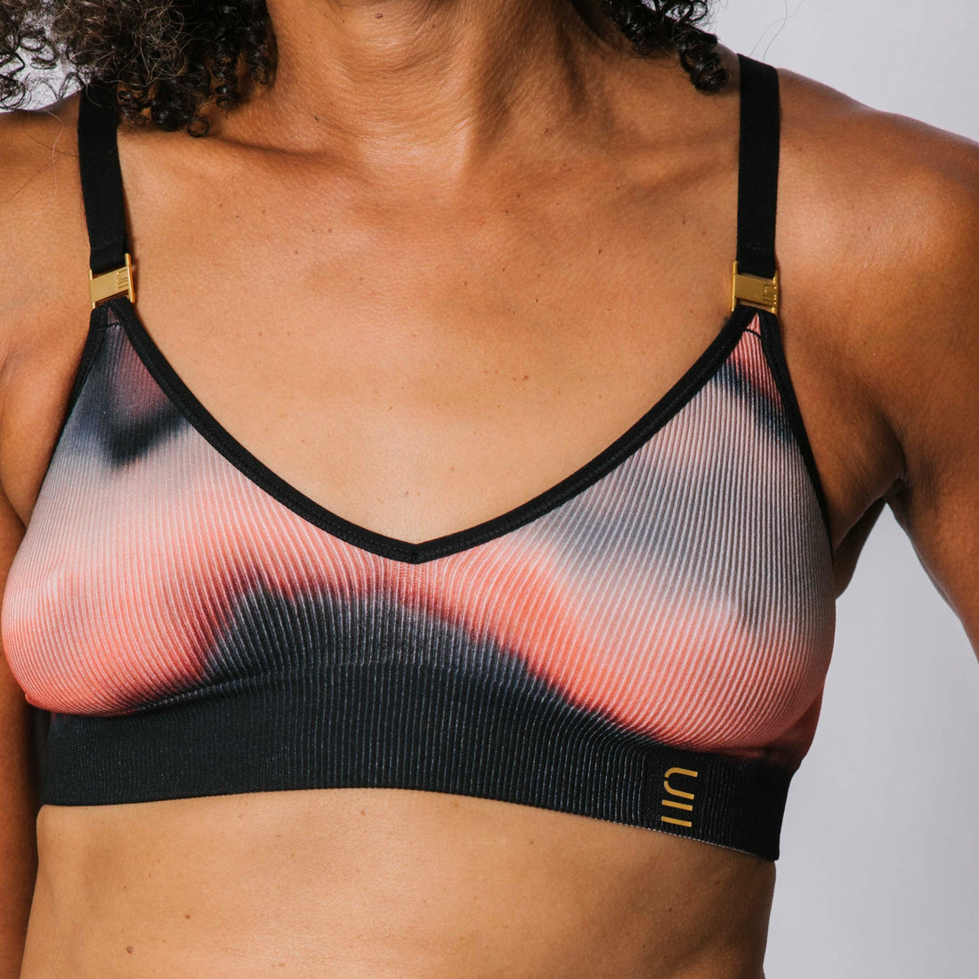 Sustainable, ethically produced elements wireless bra by Underwear for Humanity. A -D cup sizes. Recycled materials, flexible, supportive. Knitted bra and band, adjustable straps. Models wear the A-D bra.