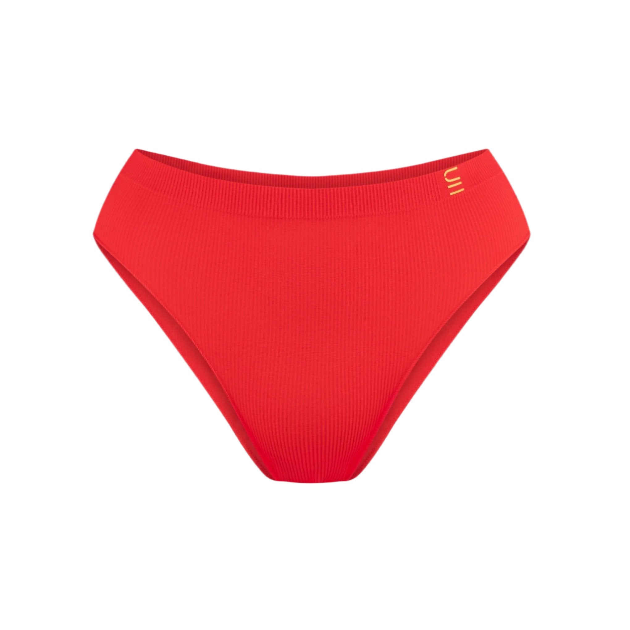 Underwear for Humanity, sustainable, organic and ethically made red underwear.  Soft , breathable, Cheeky coverage, sits high on hips. Model wears cheeky underwear in flame, recycled nylon elastic waist band.