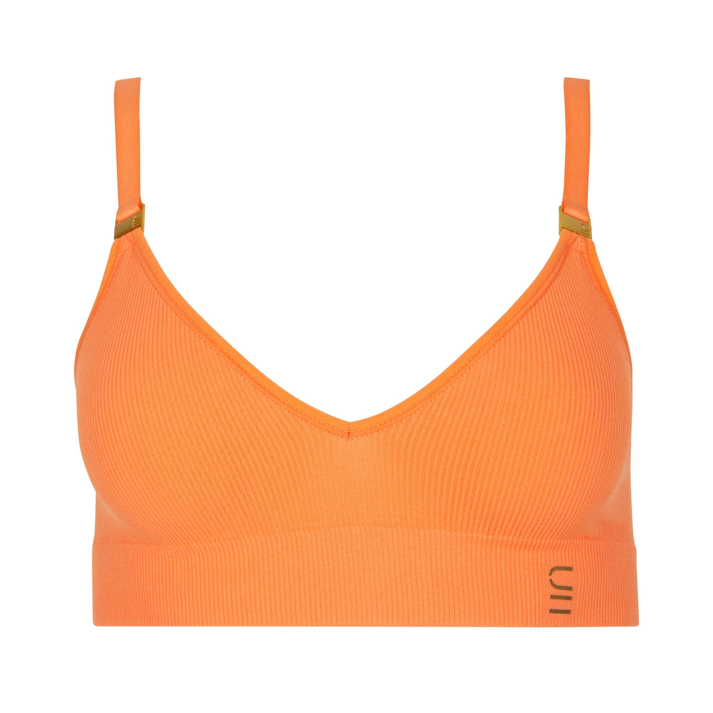 Sustainable, ethically produced mandarin wireless bra by Underwear for Humanity. DD+ cup sizes. Recycled materials, flexible, supportive. Knitted bra and band, adjustable straps. Models wear the DD+ bra.