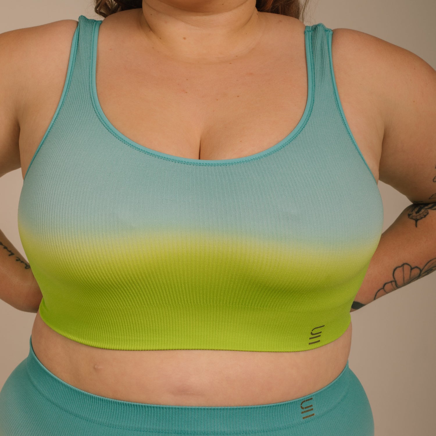 Sustainable, ethically produced ocean bra crop by Underwear for Humanity: stronger support for larger bust, D - GG cup sizes. Recycled materials, knitted bra and band, seamfree, made from recycled nylon. Models wear the D+ Crop
