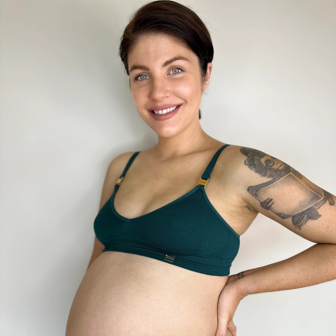 Sustainable, ethically made, atlantis wireless maternity bra by Underwear For Humanity. A -D and DD-GG cup sizes. Recycled materials, flexible, supportive, pregnancy, feeding, convertible. Knitted bra and band, adjustable straps. Model wears maternity bra