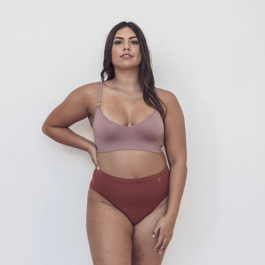 Sustainable clay high waist brief by Underwear for Humanity: ethical, sustainable. sizes 6-26. light, breathable. Models wear high-waisted underwear. underwear sits high on the waist, full seat coverage. smooth under clothing. made from Tencel and recycled materials