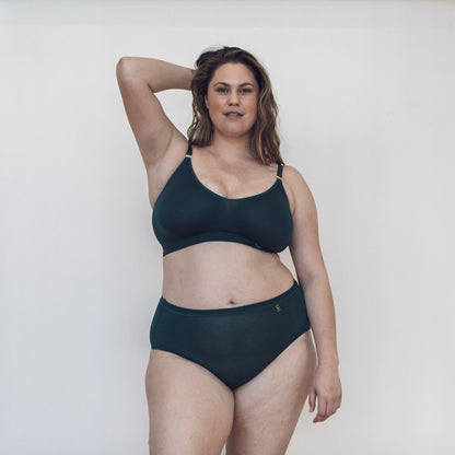 Sustainable atlantis high waist brief by Underwear for Humanity: ethical, sustainable. sizes 6-26. light, breathable. Models wear high-waisted underwear. underwear sits high on the waist, full seat coverage. smooth under clothing. made from Tencel and recycled materials