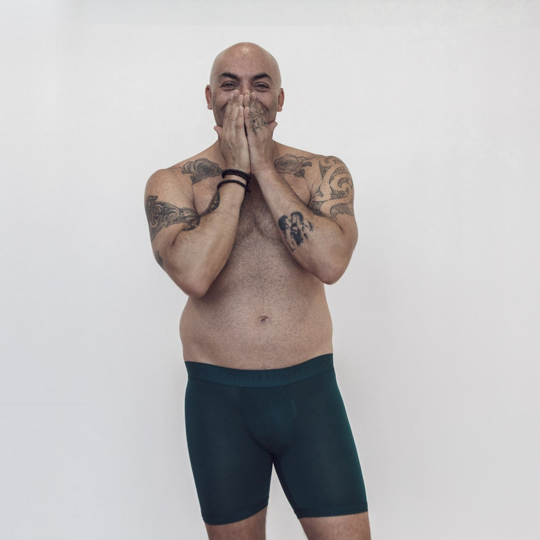 Sustainable, ethically made atlantis trunk style underwear. Long leg, wide thigh fit with elastic bind, no riding, cup support close to the body. made with tencel fabric and recycled elastic, thin, no dig waist band. Model wears shorts
