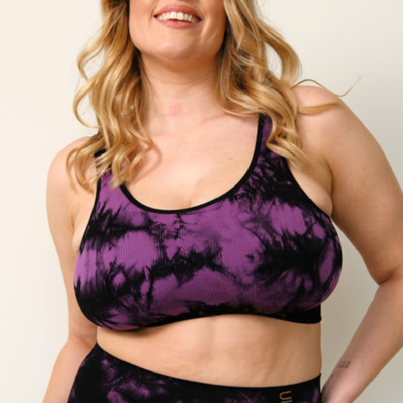 Sustainable, ethically produced black and orchid tie dye bra crop by Underwear for Humanity: stronger support for larger bust, D - GG cup sizes. Recycled materials, knitted bra and band, seamfree, made from recycled nylon. Models wear the D+ Crop